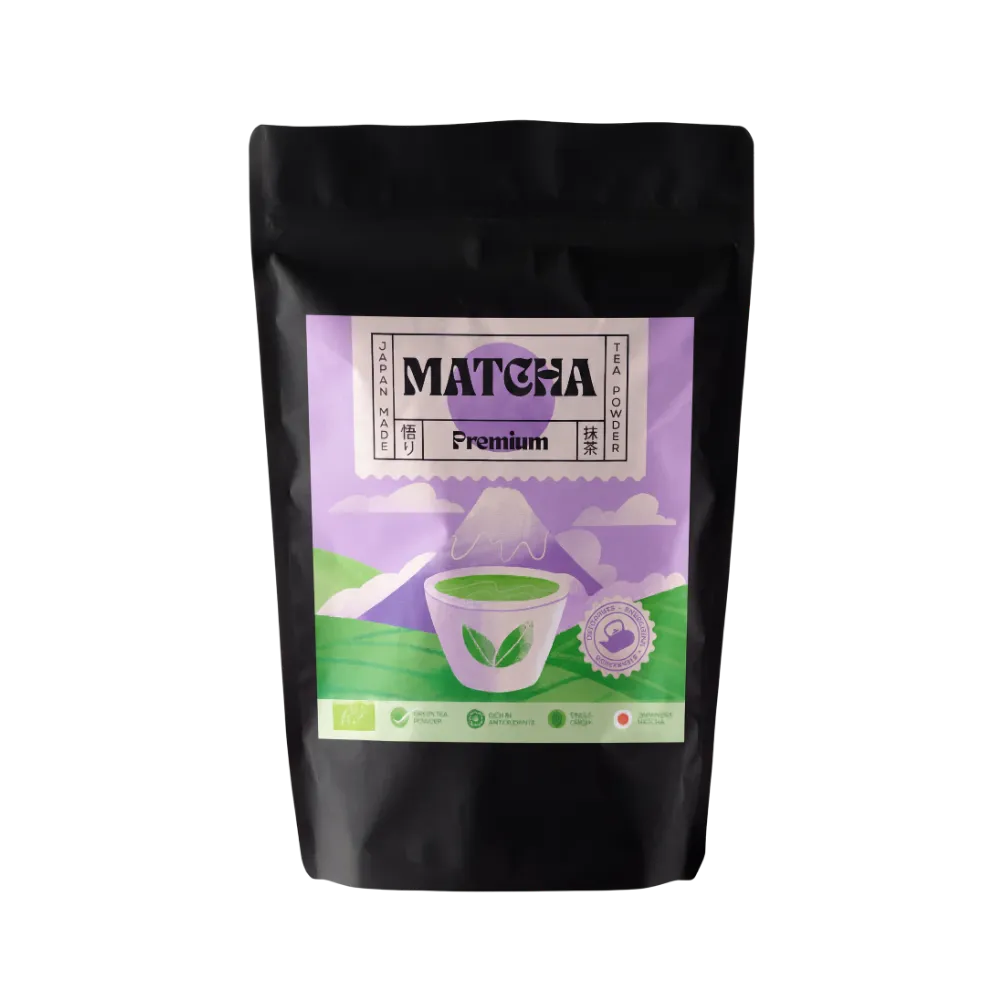 Premium grade organic matcha tea powder 80g in a black matte stand-up pouch with Japanese-style purple and green label featuring Mount Fuji illustration