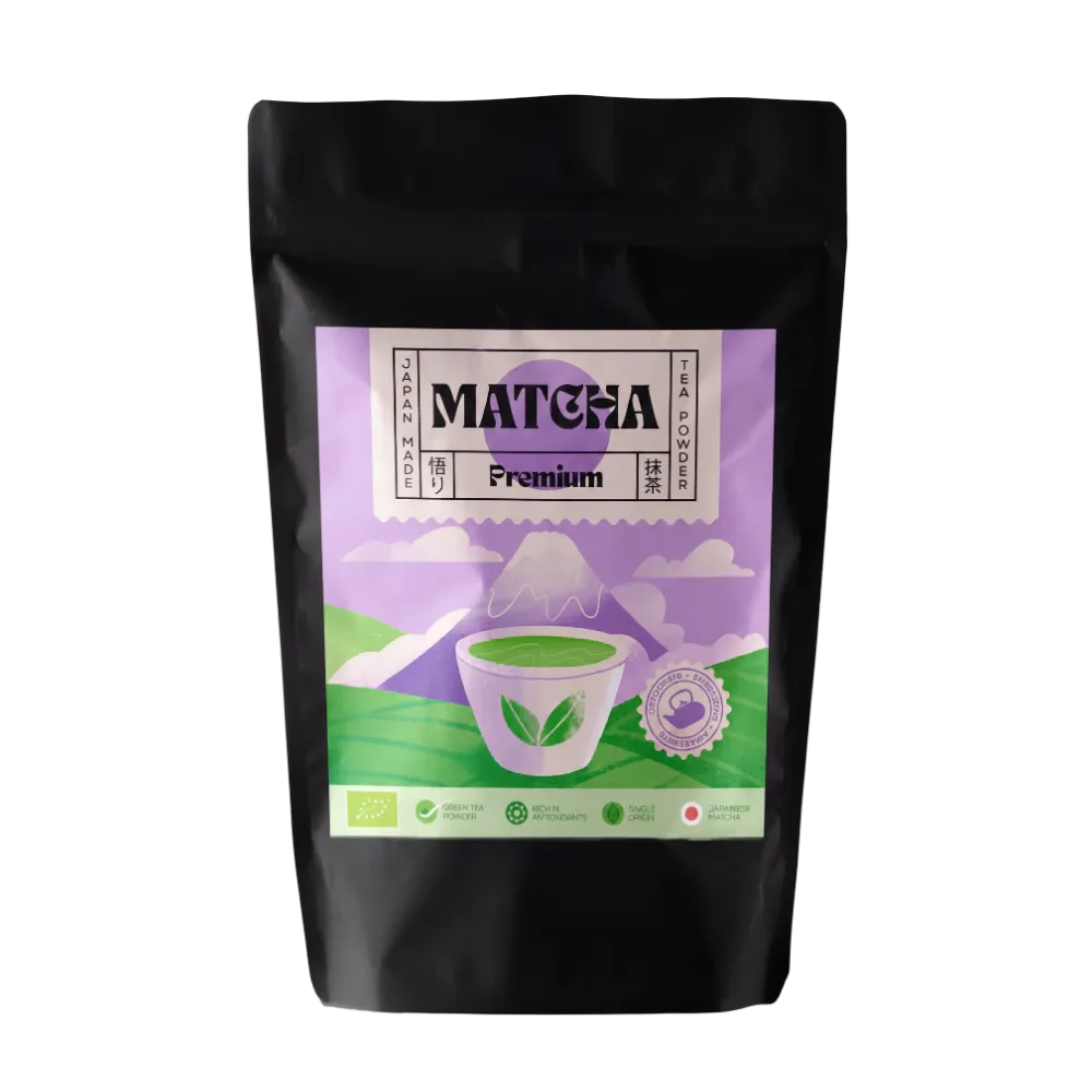 Premium grade organic matcha tea powder 500g in a black matte stand-up pouch with Japanese-style purple and green label featuring Mount Fuji illustration