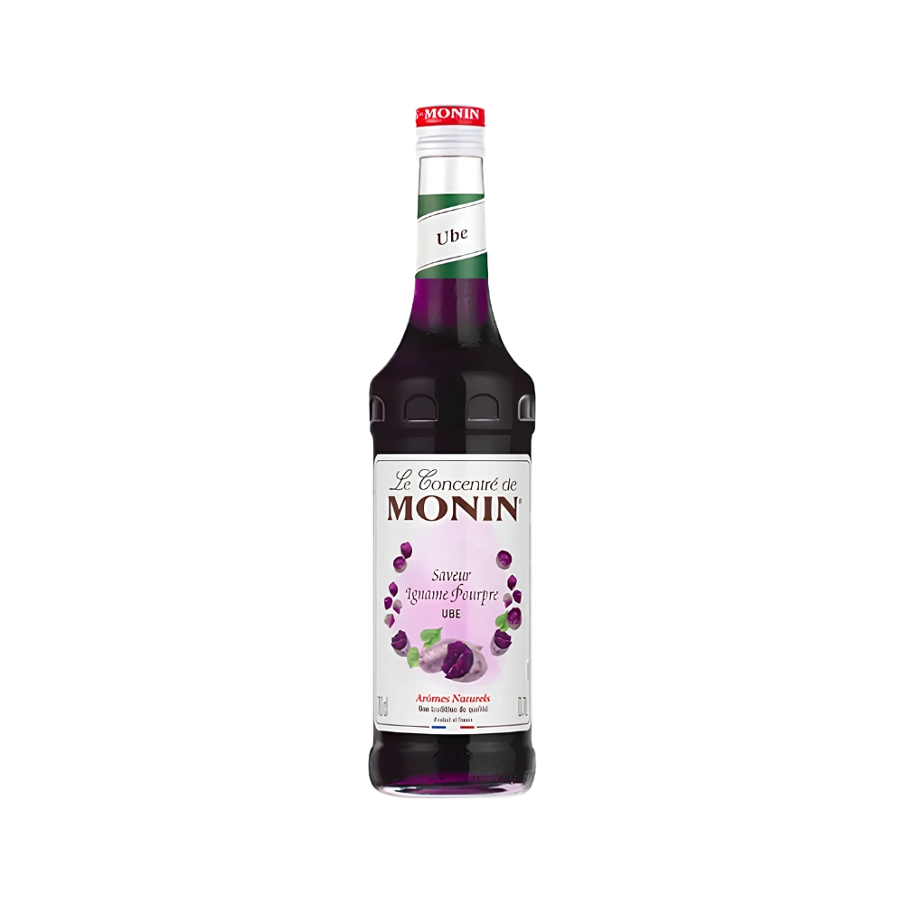 Бутилка Monin сироп Ube (лилав ямс) 700 мл с наситено виолетов сироп и червено-бяла капачка на бял фон